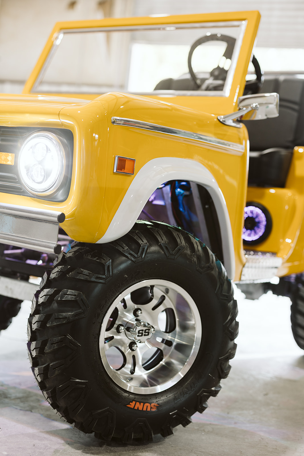 Yellow Retro Ride front quarter panel and wheel detail